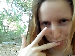 Redhead teen sucks in the woods