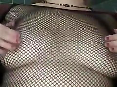 aged wife une granny fishnet squeezes her nipps
