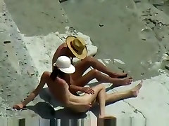 Voyeur tapes a skinny girl having a doggystyle quickie on a janea ramirez beach