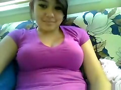 Cute on oven american girl flashes her big tits on cam for her bf