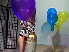 Girls to pump inflate balloons in interior leather bar to blow