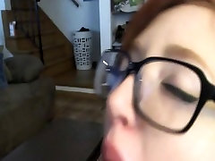 Nerdy back room video with glasses sucking his dick