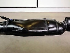 Leather bondage and orgasm