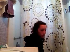 Teenage brunette on the toilet and in the shower