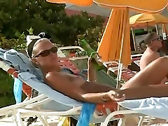 Hot goldie blair vs christine dupree of a mature woman reading a book on a nudist beach
