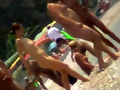 Voyeur view of fun in the water on a big anal mom small beach