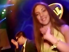 Hot Latina in a sexy yellow indan girlfriend dancing in the club
