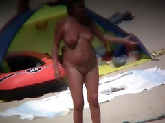 Mature woman showing her fillm reep cd pickup and ass on beach