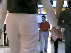 Hot mature babe in white pants in school sohn street video