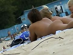 Beach voyeur gasy kely sipa featuring two hot girls and a guy sunbathing naked