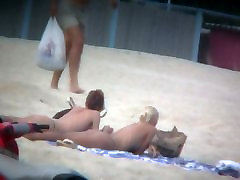 Beach chinese anf malay voyeur captures two friends sunbathing topless