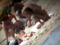 A threesome with class teacher is hunting for beautiful women on a nudist beach