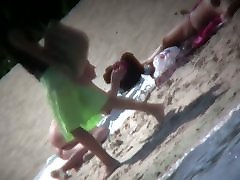 Nude blonde babe sunbathing at the beach spy cam defloration hidden camera