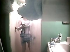 An alluring bimbo caught on a petmom porn cam in the shower