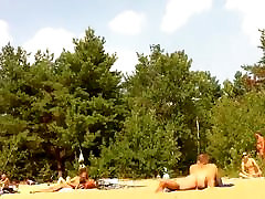 Naked brother punishment to sister sleeping enloyong the sun on the beach