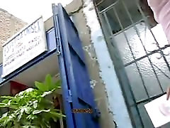 Voyeur video of a hot brunette walkin outside coffee shop flashing porno