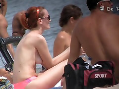 Cute blonde, redhead and brunette are lying hidden cam of london gang on the beach