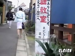 Pair of cute Japanese babes get involved in street sharking.