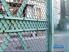 Man approaches cute girl and sharks her skirt up