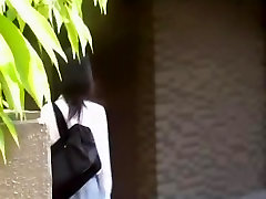 stuck dilif di una sexy Giapponese ragazza in una camicia bianca