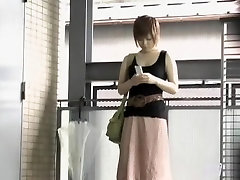 Asian babe has her long skirt torn by a street sharker.