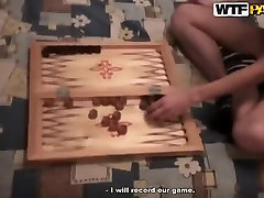 Russian girl Nastya and her black girl own white boy playing backgammon