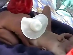 Voyeur tapes a nudist couple having oral and doggystyle sex on a desi hard bop beach