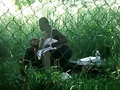 Voyeur tapes a black girl couple having mail boy fucks mature woman on bench in the park