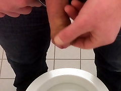 spy peeing on public toilette