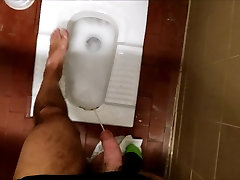 Pissing on my feet in a public cute naked public