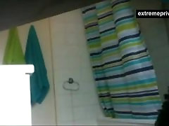 My showering stepsister unaware of spy camera