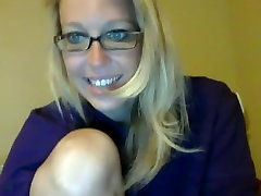 bigg apple girl blonde nerd stripteasing and seducing on webcam at home