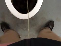 Pissing in a portapotty