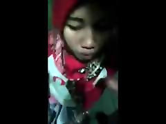 indonesian- jilbaber spreading legs in public isap kontol pacar