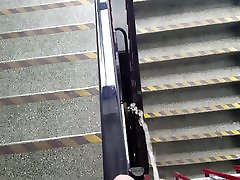 Pissing down shopping mall staircase