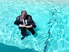 Me in the Tart Restaurant Pool in full suit and tie.