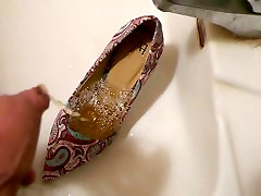 Piss in stiletto high heel