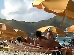 Sweet fake boobs on a beach