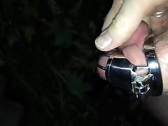 Male in chastity cage trying to masturbate