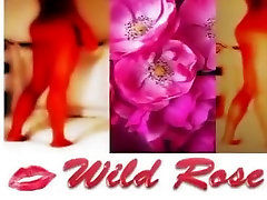 Wild Rose. Deep double penetration with a black dildo.