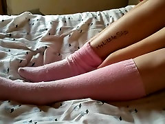Sister gives a footjob to her brother and makes him cum on her panties