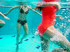 Nina Mohnatka and two ginger babes undress under the water