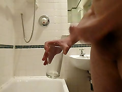 Wank and cum in bathroom into glass