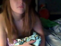 Girl watch nerd glass and plays on webcam