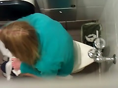 Peeing girl spied in a high school toilet
