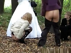 Three ladies help bride aleta icen outdoors
