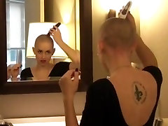 Sexy model shaves her own head bald
