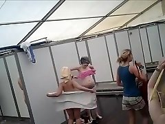 Dozens of actresses funny yogo in tented locker area