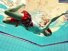 Hot Polish redhead swimming in the pool