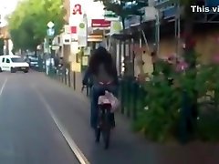 Red dani daniel pregnant woman riding bike